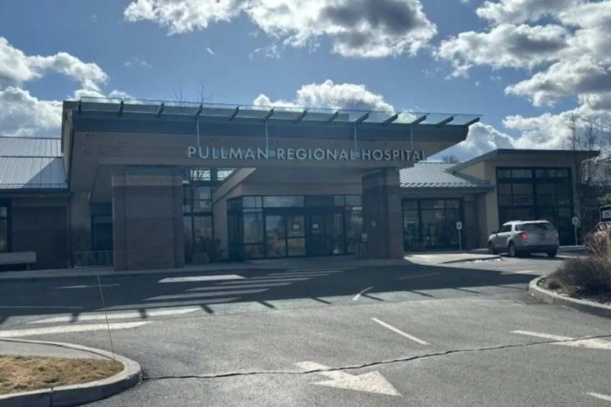 A large building with a sky background